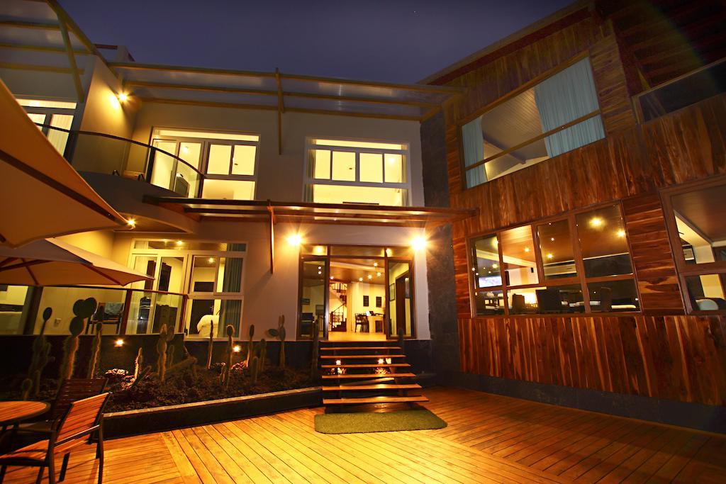 Iguana Crossing Boutique Hotel Puerto Villamil Habitación foto
